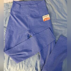 Free people Blue/purple Leggings. Size small NWT. Never worn . Amazing quality